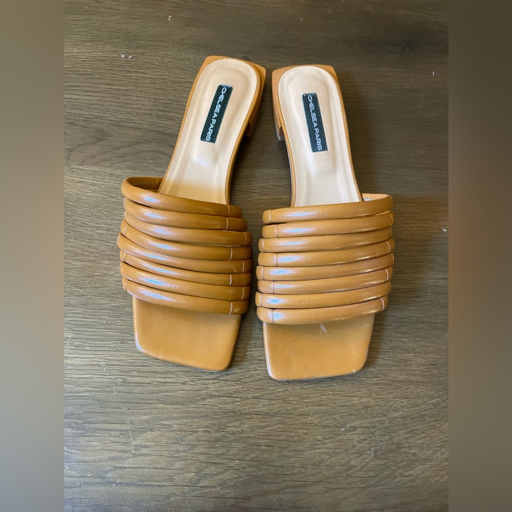 Chelsea Paris brown slip on sandals.